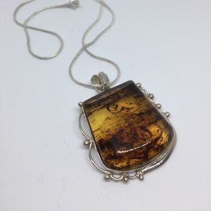 Amazing amber pendant with sterling silver